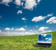 Image of laptop and clouds.