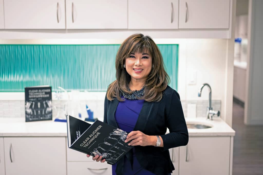 Sandra Tai with book clear aligner techniques